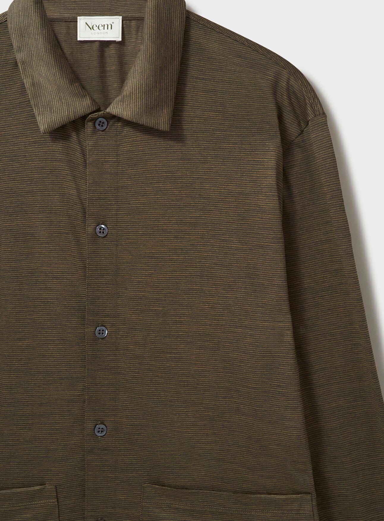 Gilet en jersey de laine mérinos à rayures couleur camel