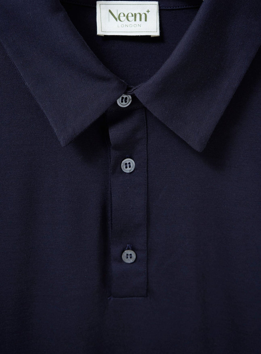 Polo à manches longues en jersey de laine mérinos bleu marine