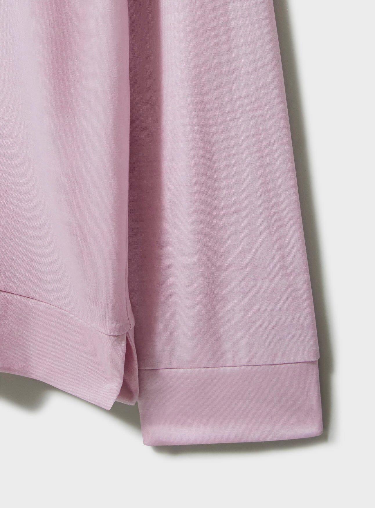 Polo manches longues en jersey de laine mérinos rose